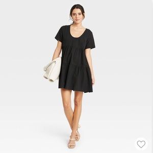Black mini dress with pockets